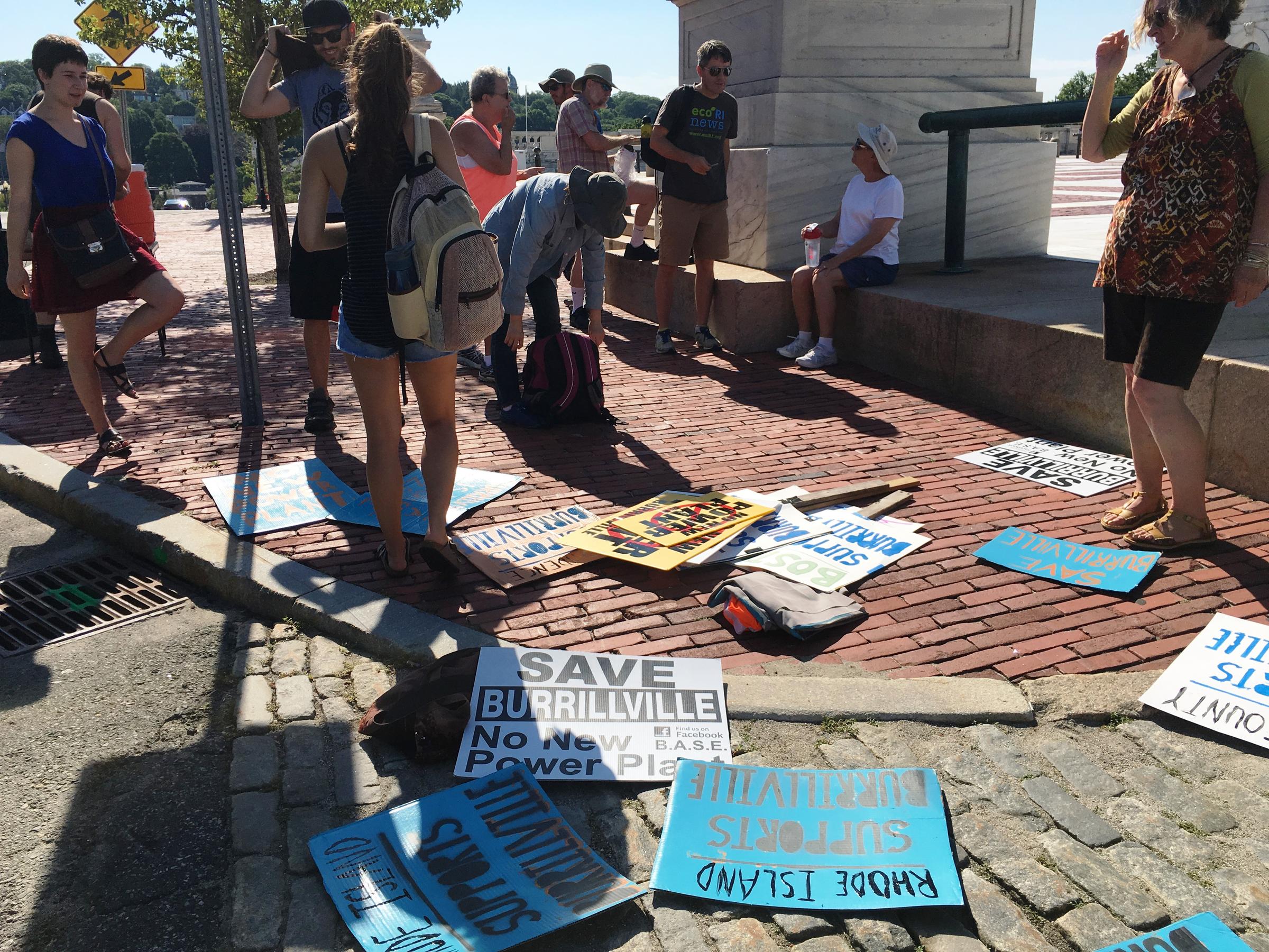 Burrillville power plant protesters standing outside the Rhode Island Statehouse. Credit Ambar Espinoza / RIPR