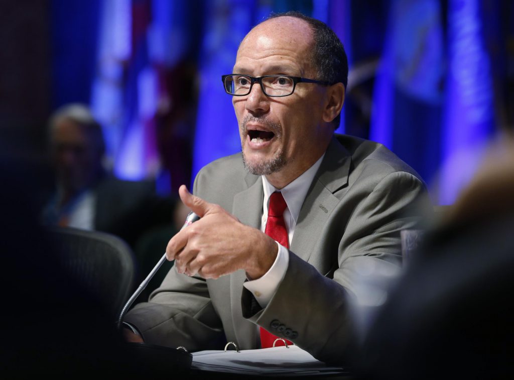 US Labor Secretary Thomas Perez gestures during a presentation during a meeting of the Education and Workforce Committee at the National Governors Association Summer meeting at the Greenbrier in White Sulphur Springs, W. Va., Saturday, July 25, 2015. Credit: Steve Helber, Associated Press.