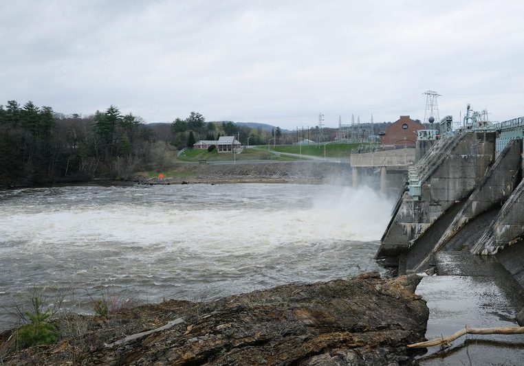Whitewater rushes out of Wilder Dam, near Hanover, in early May. Photo by Britta Greene for NHPR